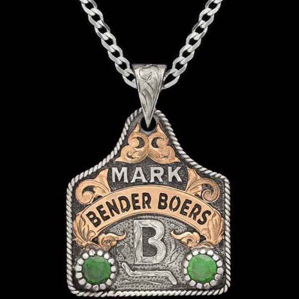 Experience timeless elegance with our Tux Cow Tag Necklace adorned with your ranch logo and custom lettering on a bronze banner wih personalized stone color. Pair it with a special discount sterling silver chain! 
